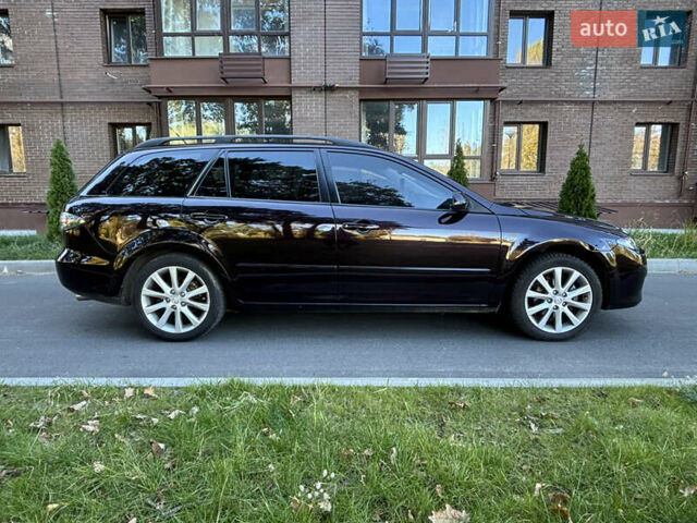 Черный Мазда 6, объемом двигателя 2.3 л и пробегом 201 тыс. км за 5600 $, фото 9 на Automoto.ua