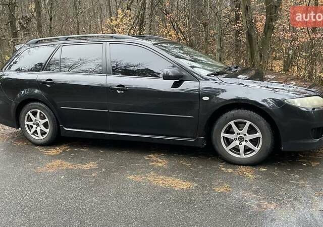 Черный Мазда 6, объемом двигателя 2.3 л и пробегом 293 тыс. км за 5300 $, фото 7 на Automoto.ua