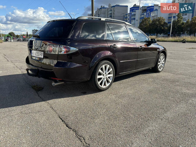 Черный Мазда 6, объемом двигателя 2.3 л и пробегом 202 тыс. км за 5250 $, фото 2 на Automoto.ua