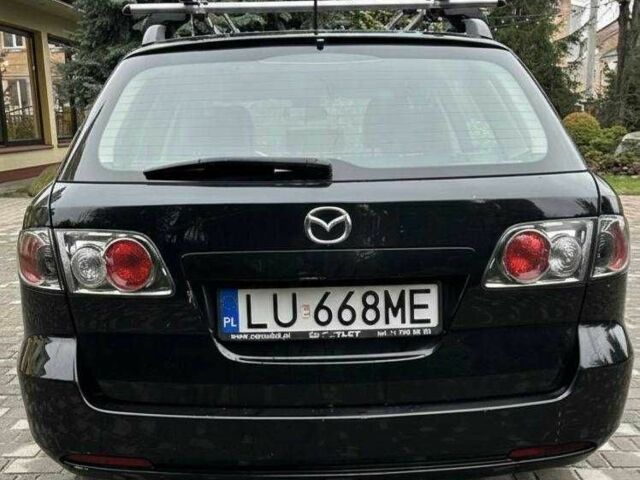 Чорний Мазда 6, об'ємом двигуна 2 л та пробігом 320 тис. км за 2000 $, фото 4 на Automoto.ua
