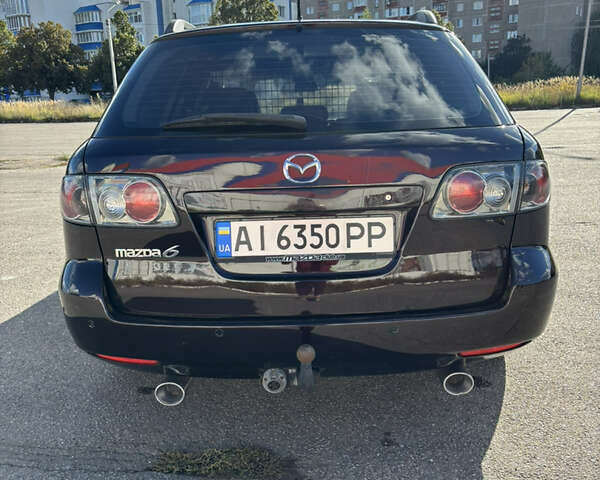 Черный Мазда 6, объемом двигателя 2.3 л и пробегом 202 тыс. км за 5250 $, фото 9 на Automoto.ua
