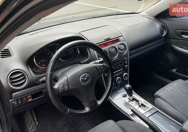 Черный Мазда 6, объемом двигателя 2.3 л и пробегом 293 тыс. км за 5300 $, фото 10 на Automoto.ua