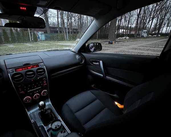 Черный Мазда 6, объемом двигателя 2 л и пробегом 140 тыс. км за 5200 $, фото 12 на Automoto.ua