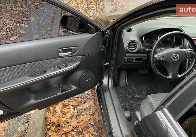 Черный Мазда 6, объемом двигателя 2.3 л и пробегом 293 тыс. км за 5300 $, фото 12 на Automoto.ua