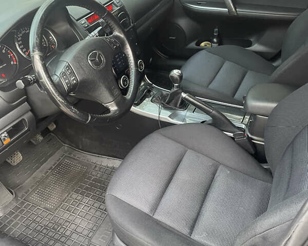 Черный Мазда 6, объемом двигателя 1.8 л и пробегом 251 тыс. км за 6200 $, фото 24 на Automoto.ua