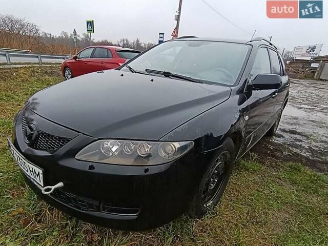 Чорний Мазда 6, об'ємом двигуна 2 л та пробігом 445 тис. км за 2400 $, фото 4 на Automoto.ua