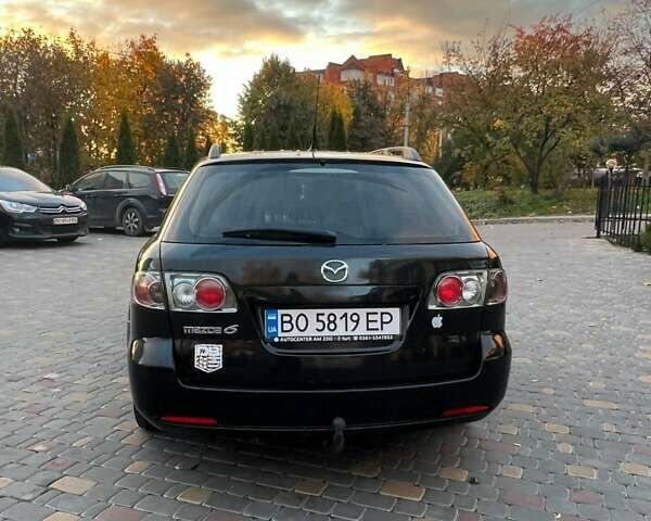 Черный Мазда 6, объемом двигателя 2 л и пробегом 344 тыс. км за 2900 $, фото 3 на Automoto.ua
