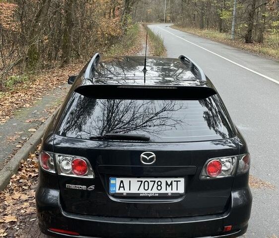 Черный Мазда 6, объемом двигателя 2.3 л и пробегом 293 тыс. км за 5300 $, фото 7 на Automoto.ua