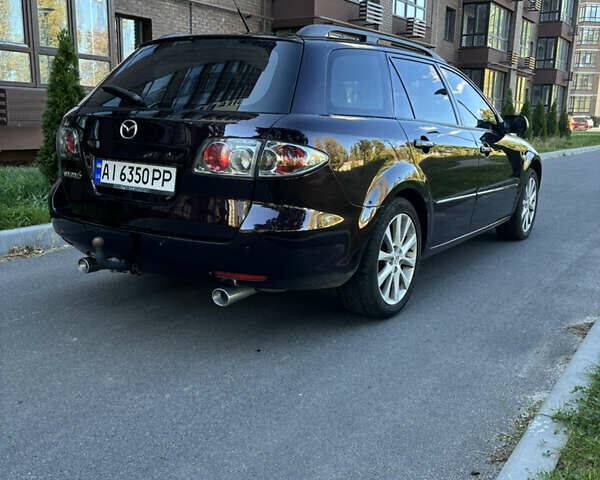 Черный Мазда 6, объемом двигателя 2.3 л и пробегом 201 тыс. км за 5600 $, фото 5 на Automoto.ua