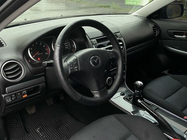 Черный Мазда 6, объемом двигателя 2 л и пробегом 140 тыс. км за 5700 $, фото 8 на Automoto.ua