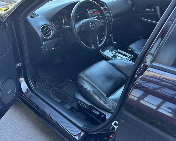 Черный Мазда 6, объемом двигателя 2.3 л и пробегом 202 тыс. км за 5100 $, фото 12 на Automoto.ua