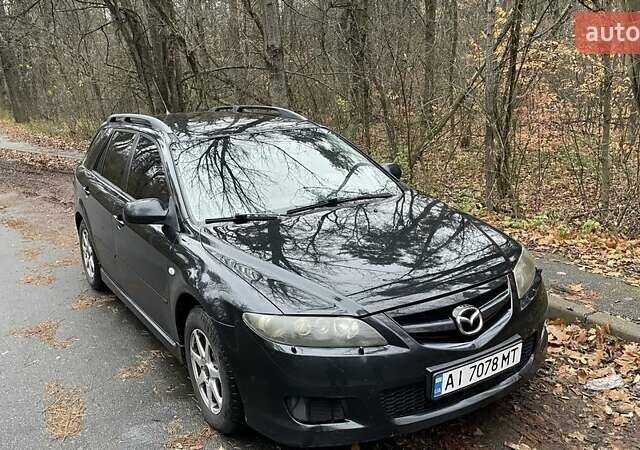Черный Мазда 6, объемом двигателя 2.3 л и пробегом 293 тыс. км за 5300 $, фото 4 на Automoto.ua