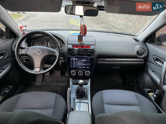 Черный Мазда 6, объемом двигателя 1.8 л и пробегом 251 тыс. км за 6200 $, фото 15 на Automoto.ua
