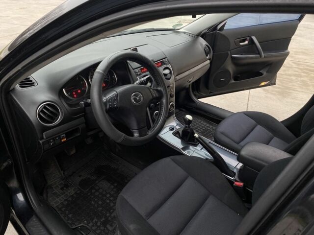 Черный Мазда 6, объемом двигателя 2 л и пробегом 345 тыс. км за 3450 $, фото 10 на Automoto.ua