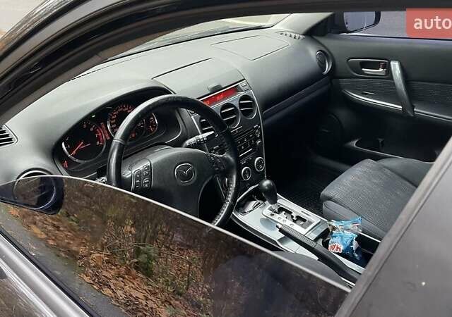 Черный Мазда 6, объемом двигателя 2.3 л и пробегом 293 тыс. км за 5300 $, фото 9 на Automoto.ua