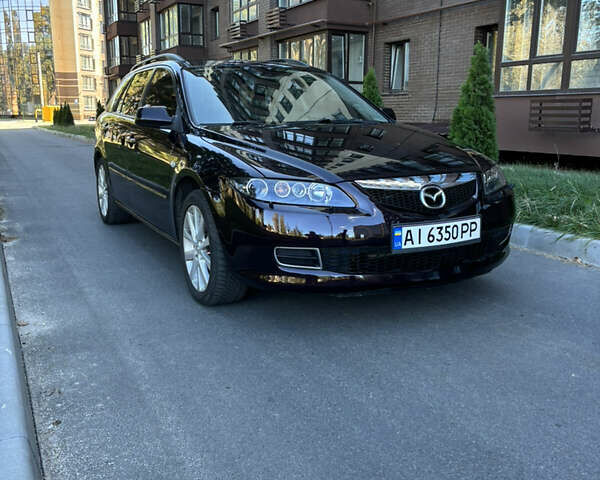 Черный Мазда 6, объемом двигателя 2.3 л и пробегом 201 тыс. км за 5600 $, фото 1 на Automoto.ua