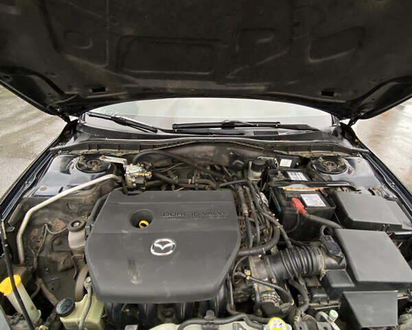 Черный Мазда 6, объемом двигателя 2 л и пробегом 140 тыс. км за 5700 $, фото 11 на Automoto.ua