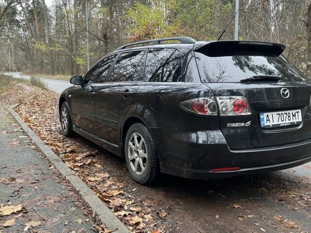 Черный Мазда 6, объемом двигателя 2.3 л и пробегом 293 тыс. км за 5300 $, фото 3 на Automoto.ua