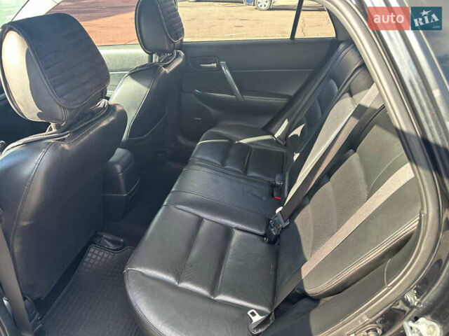 Черный Мазда 6, объемом двигателя 2 л и пробегом 342 тыс. км за 4500 $, фото 5 на Automoto.ua