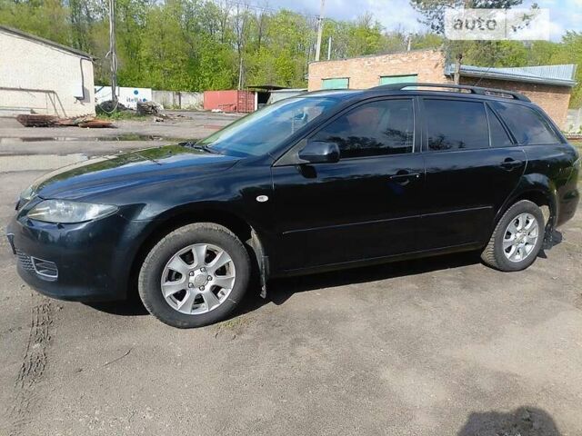 Чорний Мазда 6, об'ємом двигуна 1.8 л та пробігом 293 тис. км за 4999 $, фото 7 на Automoto.ua