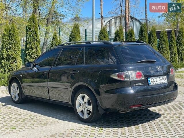 Черный Мазда 6, объемом двигателя 2 л и пробегом 152 тыс. км за 5400 $, фото 7 на Automoto.ua