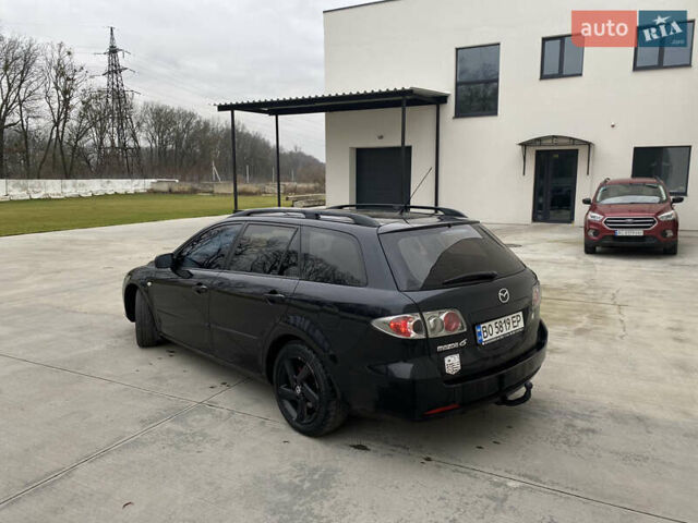 Чорний Мазда 6, об'ємом двигуна 2 л та пробігом 345 тис. км за 3450 $, фото 4 на Automoto.ua