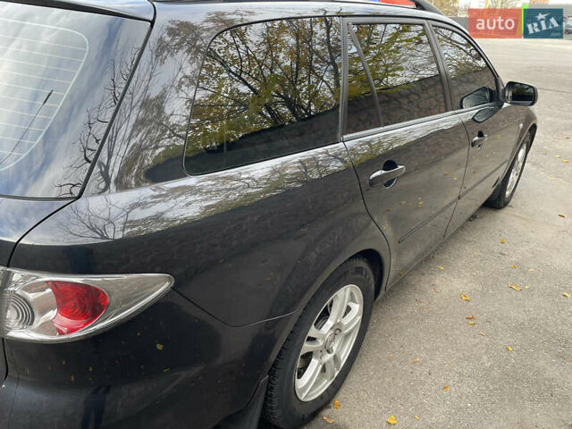 Черный Мазда 6, объемом двигателя 1.8 л и пробегом 251 тыс. км за 6200 $, фото 8 на Automoto.ua