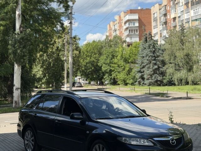 Чорний Мазда 6, об'ємом двигуна 2.3 л та пробігом 200 тис. км за 2114 $, фото 2 на Automoto.ua