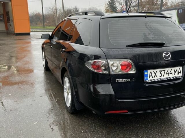 Черный Мазда 6, объемом двигателя 2 л и пробегом 140 тыс. км за 5700 $, фото 4 на Automoto.ua