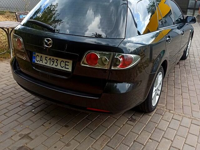 Черный Мазда 6, объемом двигателя 2 л и пробегом 325 тыс. км за 5800 $, фото 5 на Automoto.ua