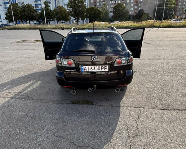 Черный Мазда 6, объемом двигателя 2.3 л и пробегом 202 тыс. км за 5250 $, фото 8 на Automoto.ua