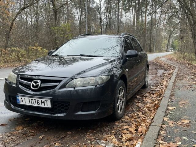 Черный Мазда 6, объемом двигателя 2.3 л и пробегом 293 тыс. км за 5300 $, фото 1 на Automoto.ua