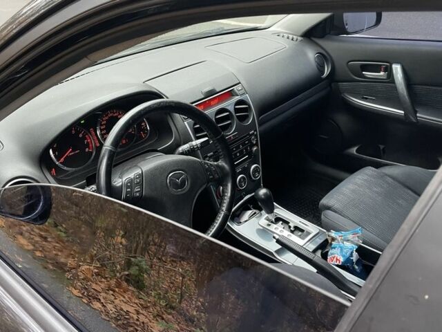 Черный Мазда 6, объемом двигателя 2.3 л и пробегом 293 тыс. км за 5300 $, фото 10 на Automoto.ua