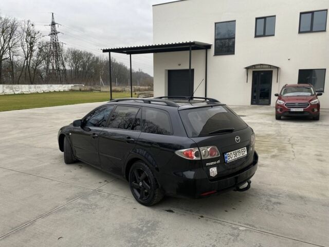 Черный Мазда 6, объемом двигателя 2 л и пробегом 345 тыс. км за 3450 $, фото 4 на Automoto.ua
