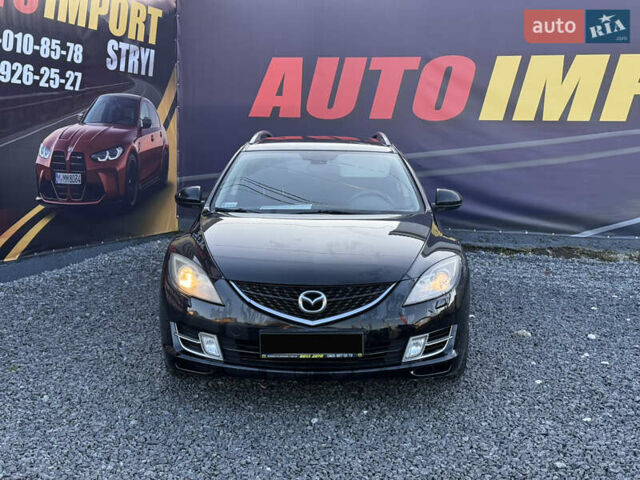 Черный Мазда 6, объемом двигателя 2 л и пробегом 331 тыс. км за 5800 $, фото 1 на Automoto.ua