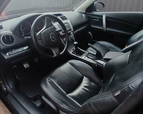 Чорний Мазда 6, об'ємом двигуна 2 л та пробігом 320 тис. км за 7300 $, фото 1 на Automoto.ua
