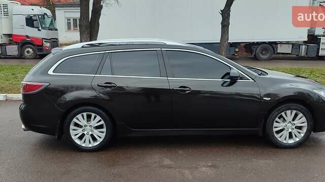 Чорний Мазда 6, об'ємом двигуна 1.8 л та пробігом 253 тис. км за 6700 $, фото 5 на Automoto.ua