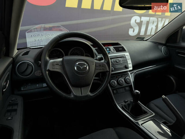 Черный Мазда 6, объемом двигателя 2 л и пробегом 306 тыс. км за 5899 $, фото 17 на Automoto.ua