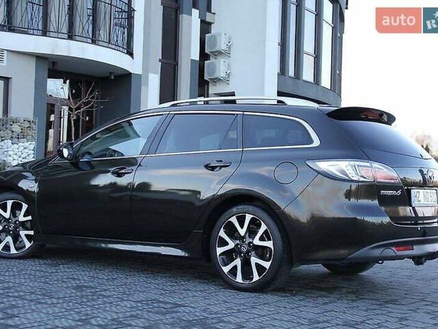 Черный Мазда 6, объемом двигателя 2.2 л и пробегом 183 тыс. км за 7700 $, фото 6 на Automoto.ua