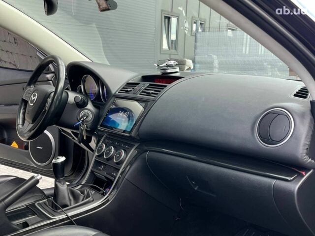 Черный Мазда 6, объемом двигателя 2 л и пробегом 267 тыс. км за 6990 $, фото 9 на Automoto.ua