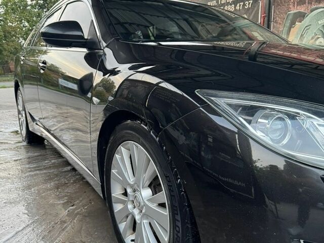 Черный Мазда 6, объемом двигателя 2 л и пробегом 208 тыс. км за 5500 $, фото 49 на Automoto.ua
