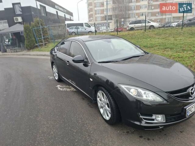 Черный Мазда 6, объемом двигателя 2 л и пробегом 351 тыс. км за 6700 $, фото 1 на Automoto.ua