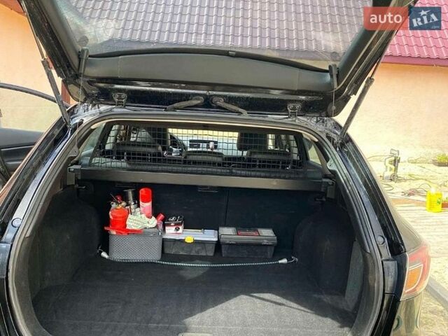 Черный Мазда 6, объемом двигателя 2 л и пробегом 248 тыс. км за 7000 $, фото 6 на Automoto.ua