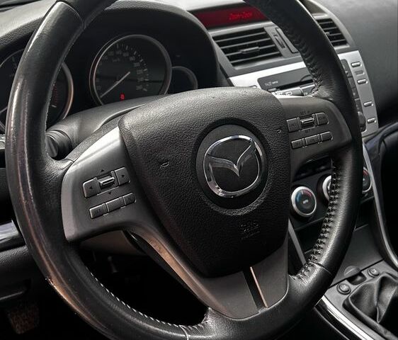 Черный Мазда 6, объемом двигателя 2 л и пробегом 230 тыс. км за 7499 $, фото 8 на Automoto.ua