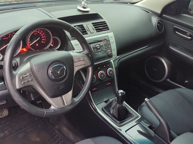 Черный Мазда 6, объемом двигателя 1.8 л и пробегом 250 тыс. км за 6700 $, фото 5 на Automoto.ua