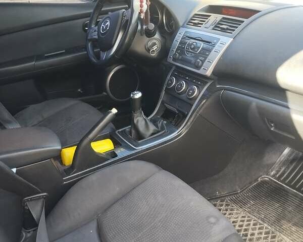 Черный Мазда 6, объемом двигателя 2 л и пробегом 315 тыс. км за 6500 $, фото 1 на Automoto.ua