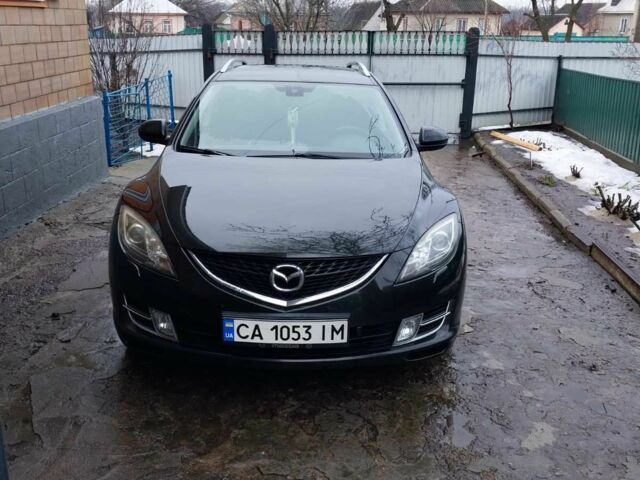 Черный Мазда 6, объемом двигателя 1.8 л и пробегом 300 тыс. км за 6000 $, фото 2 на Automoto.ua