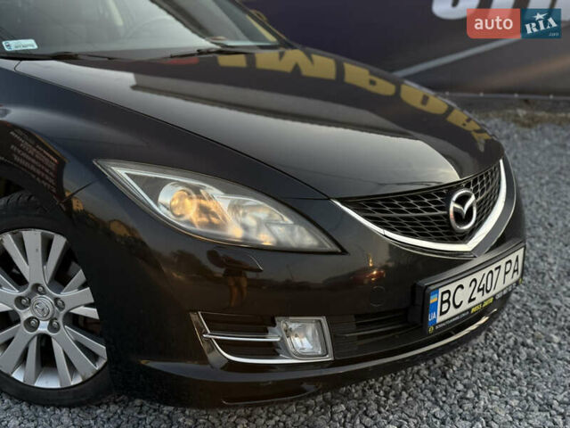 Черный Мазда 6, объемом двигателя 2 л и пробегом 306 тыс. км за 5899 $, фото 1 на Automoto.ua