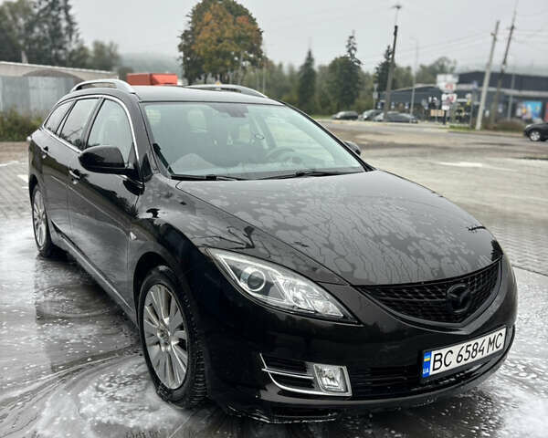 Черный Мазда 6, объемом двигателя 2 л и пробегом 250 тыс. км за 5899 $, фото 1 на Automoto.ua