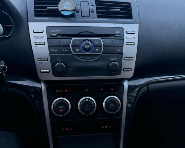 Черный Мазда 6, объемом двигателя 2 л и пробегом 331 тыс. км за 5800 $, фото 9 на Automoto.ua